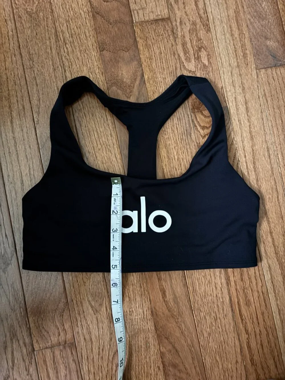 ALO Yoga Black Racerback Sports Bra with Iconic White Logo